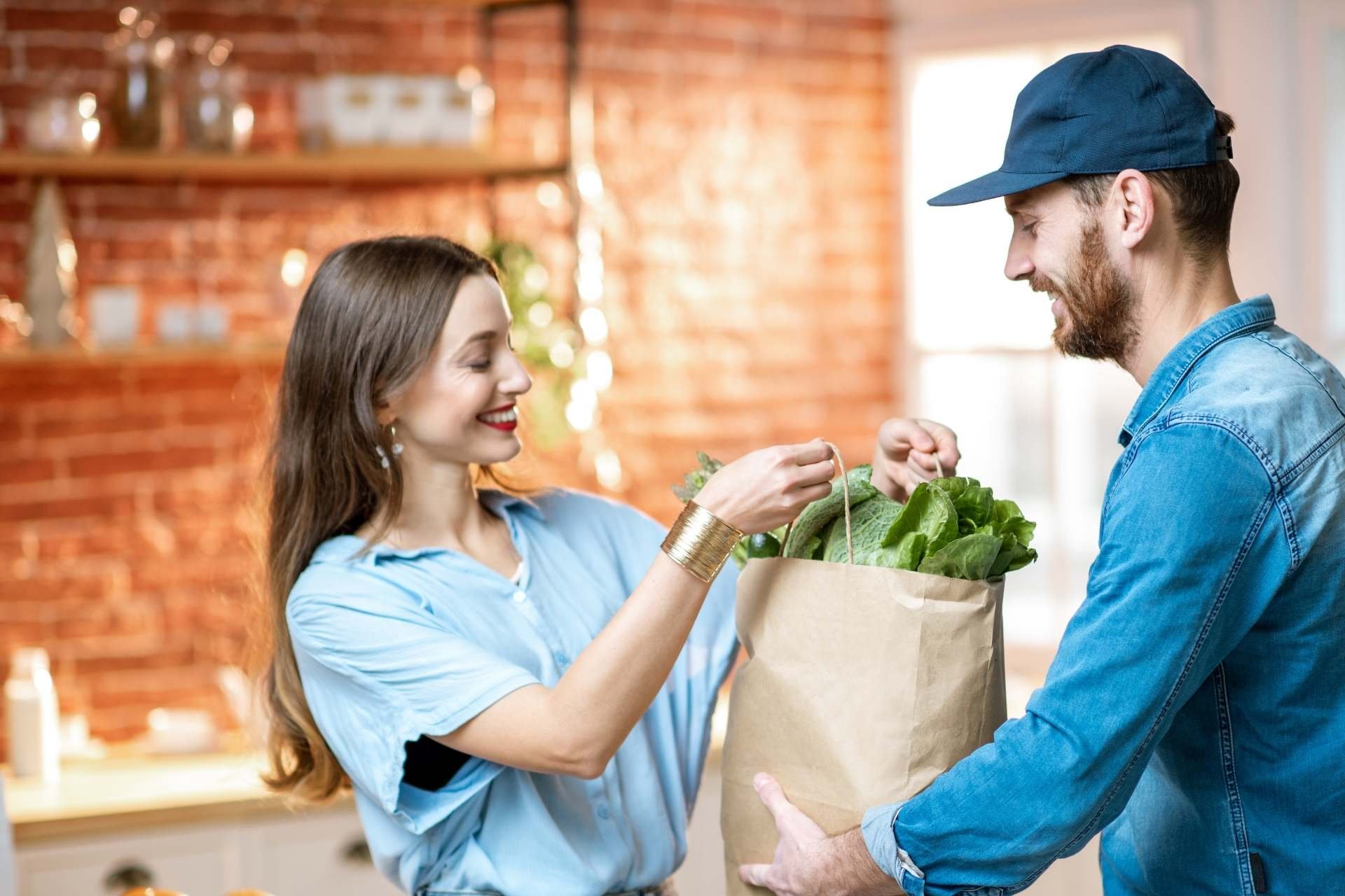 Delivery-man-arriving-to-an-household-with-groceries