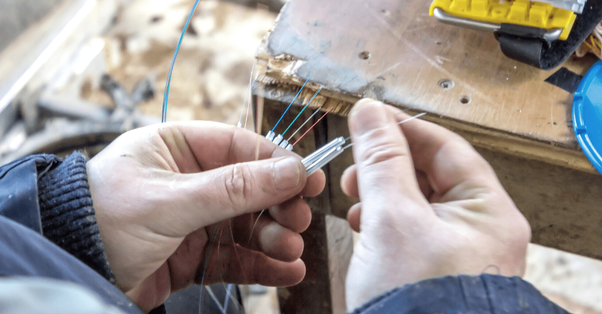 Onefield technician installing fiber